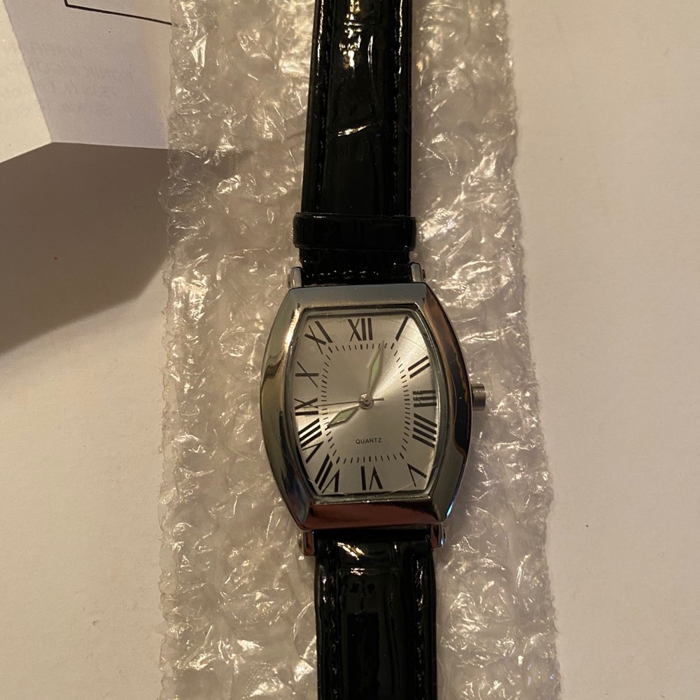 Konik & Company Inc analog quartz watch